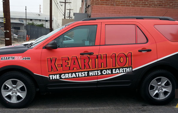 Greatest hits on Earth Radio Truck Wrap